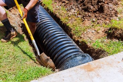 Expert sewer line repair in action.