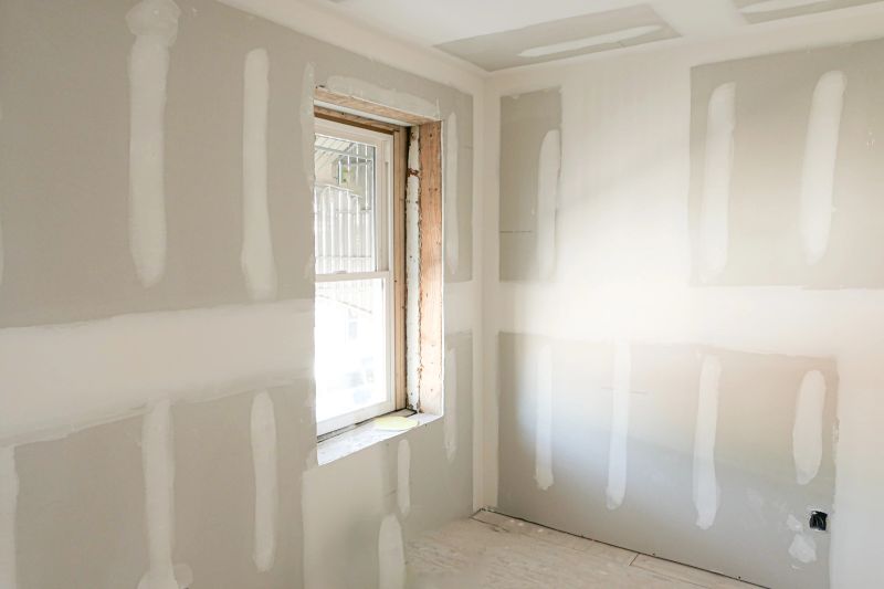 White dry wall just after being installed before being painted.