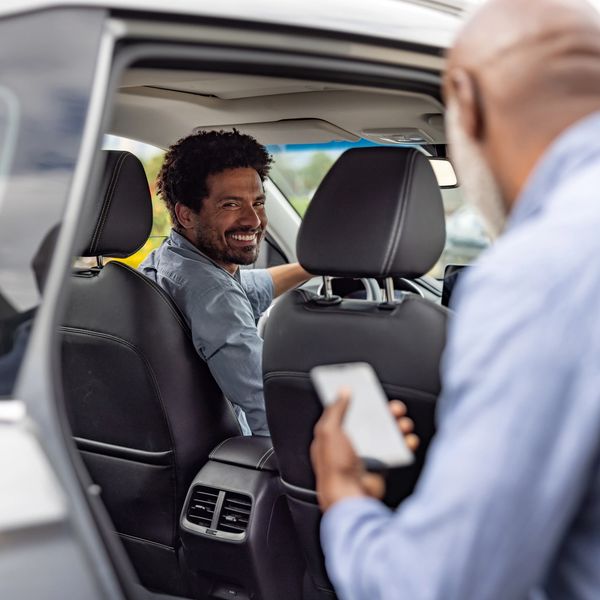 a passsenger entering our transport connect taxis cab