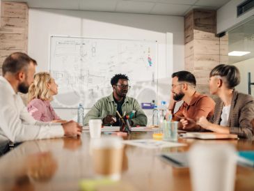 Team meeting in a modern office setting.