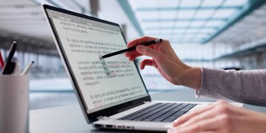 Writing on a laptop screen