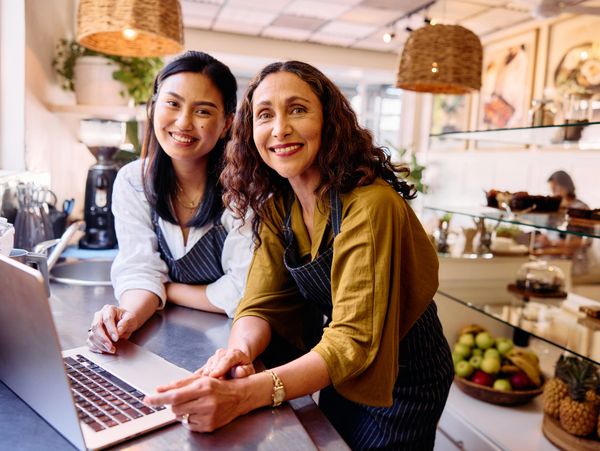 Business team discussing outside an office.