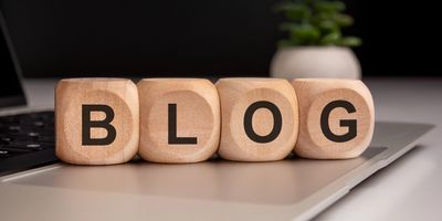 Wooden blocks that spell out the word BLOG.