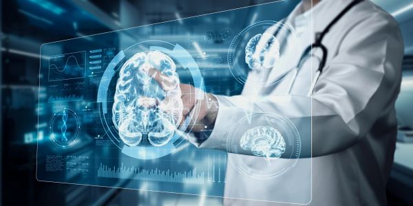 Doctor analyzing digital brain scan.