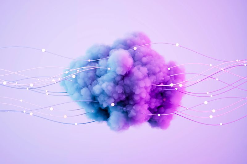 A digitally generated image featuring a glowing cloud intertwined with neon wires, symbolizing cloud computing, digital networks and futuristic technology. This conceptual design represents data connectivity, AI-driven cloud systems and modern IT infrastructure, making it ideal for technology, cybersecurity and cloud storage themes.