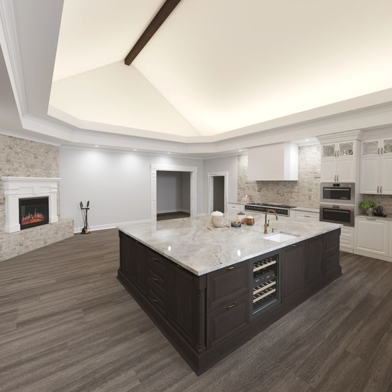 A contemporary kitchen featuring a spacious marble island, elegant cabinetry, bright lighting, and hardwood flooring, creating an inviting space for culinary activities and social gatherings.