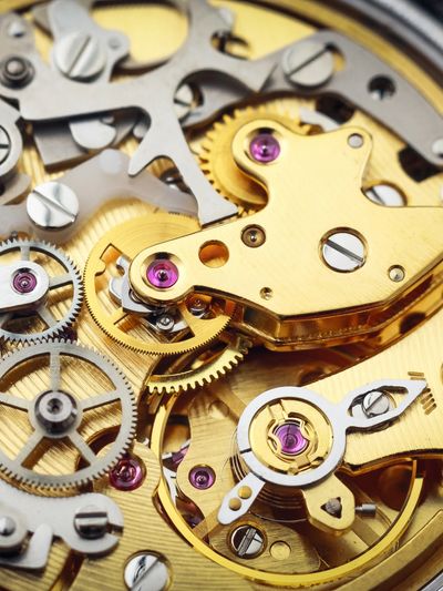 Close-up of mechanical watch gears and components.