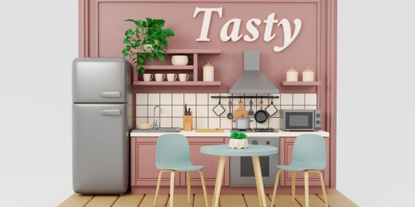 Minimalist pink kitchen with modern appliances and cozy dining setup.