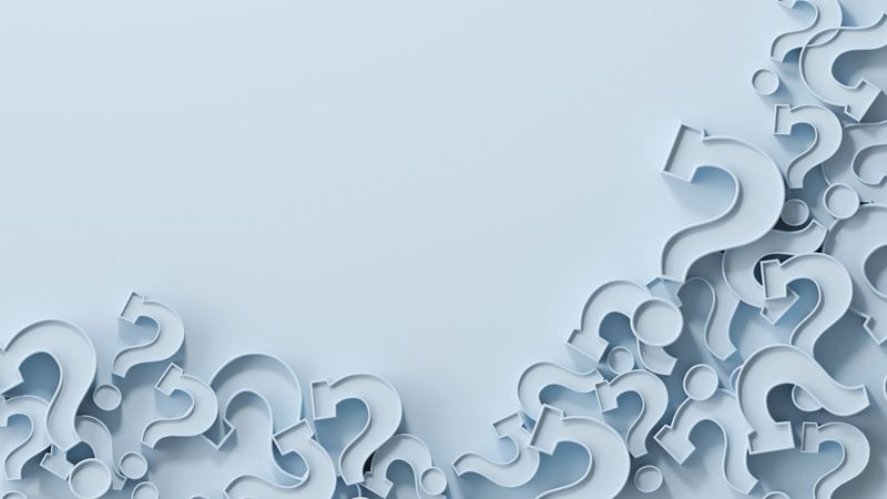 Abstract background with question mark symbols with copy space on the upper left corner of the image