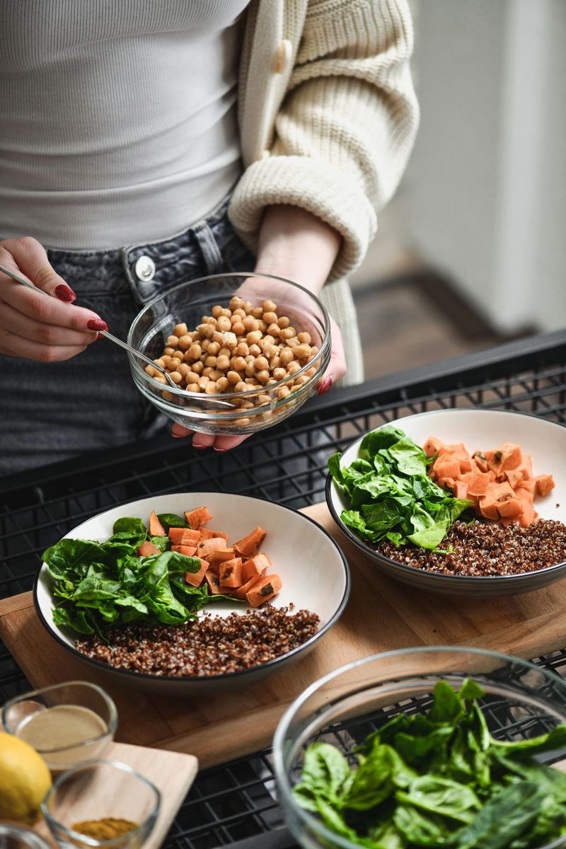 Female Making Colorful Buddha Bowls Showing Dieting Can Be Fun and Delicious