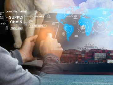 Person using tablet with supply chain and shipping graphics overlay.