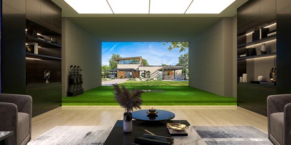 Modern living room with open view to a spacious green lawn and contemporary house.