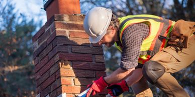 Chimney repair and cap replacement.