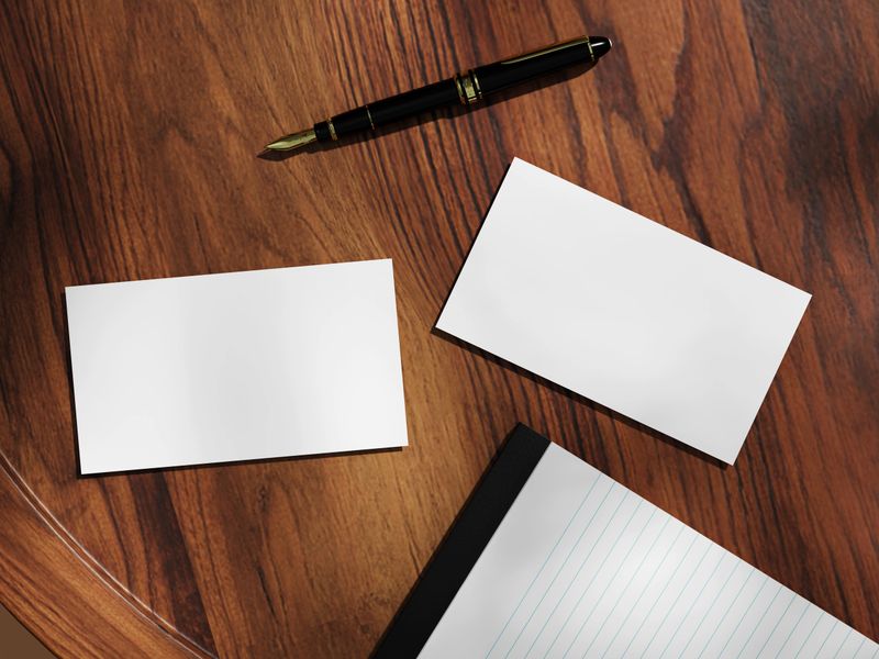 Modern Business Card Display on Smooth Wooden Tabletop