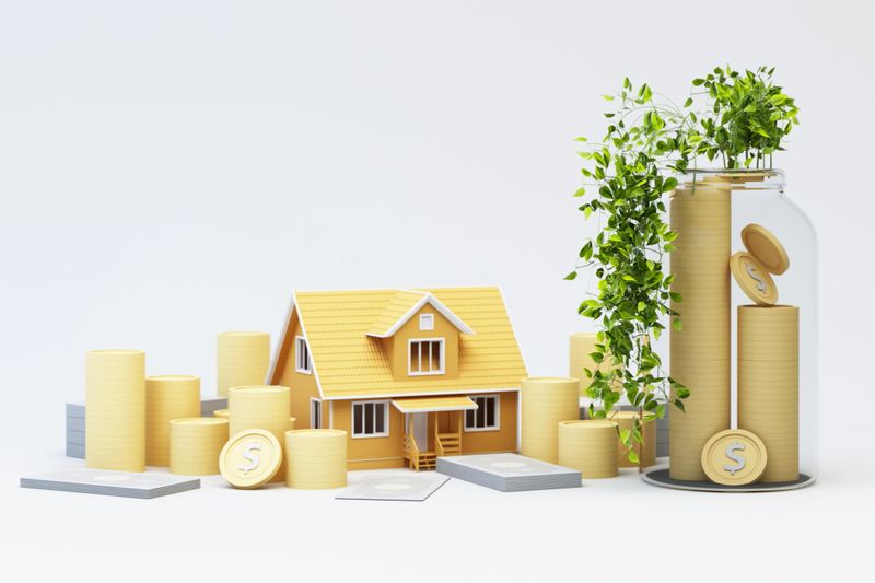 A modern house surrounded by golden coins symbolizes real estate investment. A glass jar filled with stacked coins and green plants represents financial growth and wealth accumulation. 3d rendering