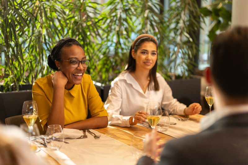 Group of multiracial people dinning in luxury restaurant