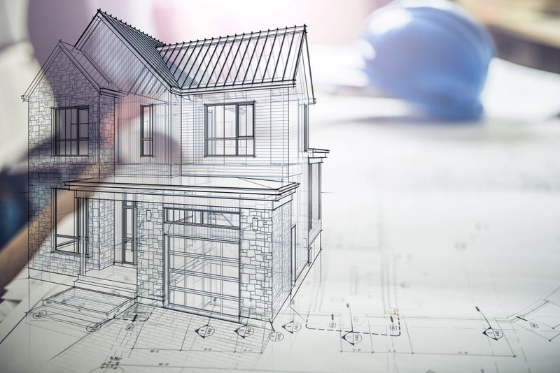Hologram of a house project over blueprints on construction site. Note to inspector: I am the author of the building project