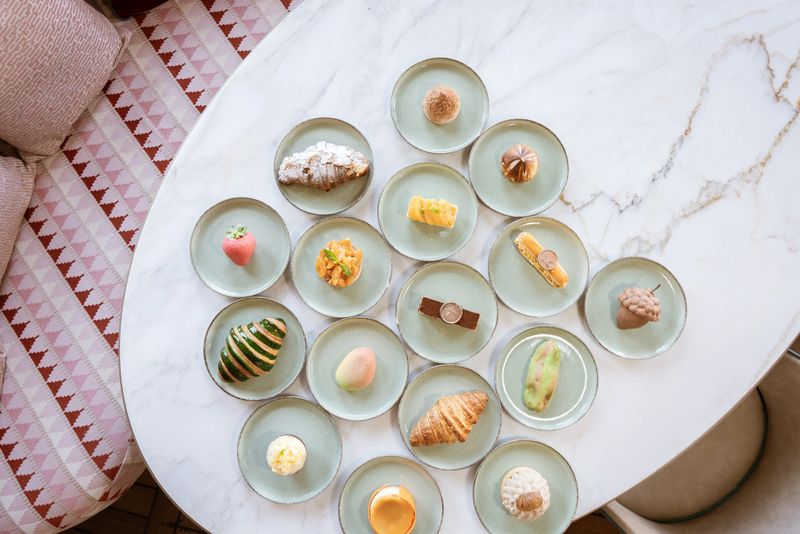 A beautifully plated dessert sits on a cozy café table, waiting to be enjoyed.