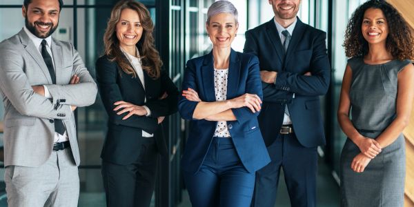Confident diverse business team posing together.