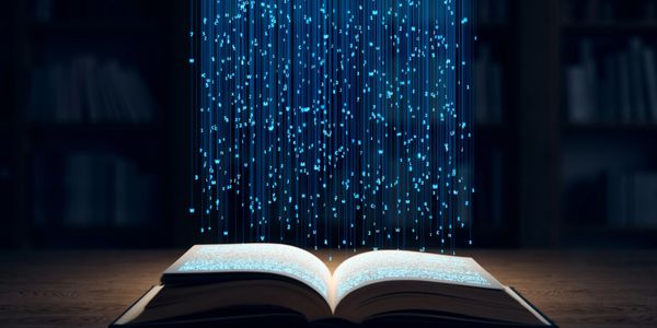 Open book with glowing digital data rising from pages.