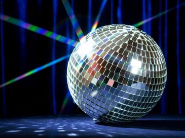 A disco ball reflecting colorful lights.