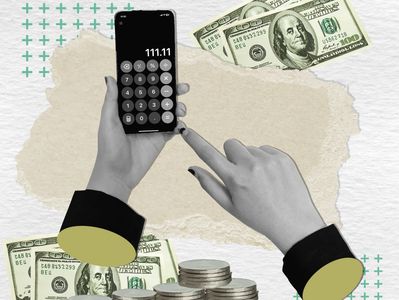 Hands using a calculator app on a phone surrounded by money and coins.