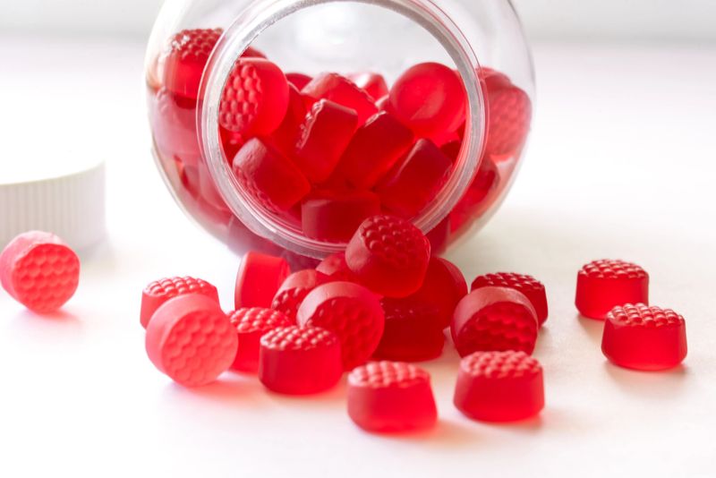 Vitamin B12 Chewable Gummies Spilled from a Bottle