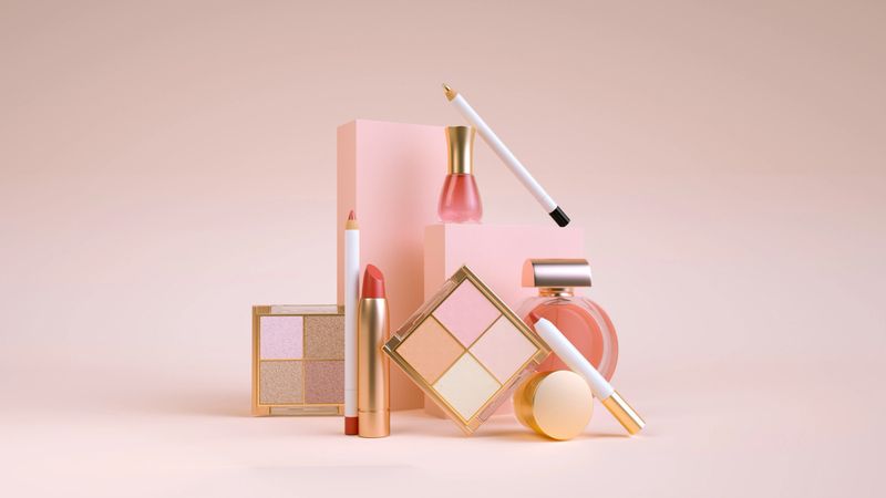 This elegant 3D render showcases a sophisticated arrangement of luxurious cosmetic and beauty products including lipstick, eyeshadow palettes, perfume bottles, and makeup pencils set against a soft pastel pink background. Highlighting beauty, fashion, and personal care themes, the composition evokes feelings of elegance, glamour, and feminine charm. Its minimalist yet stylish layout makes it highly suitable for advertising premium cosmetic products, beauty brands, skincare lines, fashion editorials, social media marketing, and lifestyle blogging. Ideal for capturing the attention of beauty enthusiasts, makeup artists, fashion influencers, or as a striking visual asset for branding campaigns emphasizing sophistication, exclusivity, and modern aesthetics.
