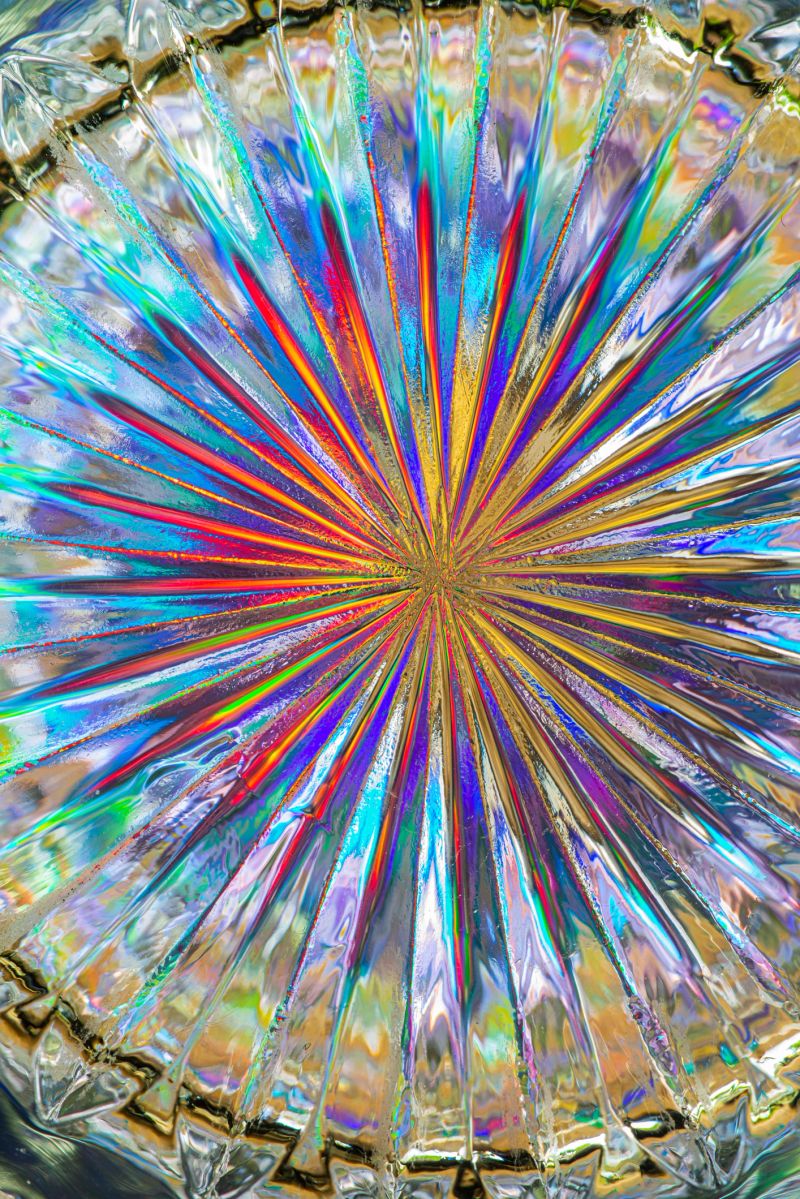 Crystal glass illuminated by the colors of the solar spectrum