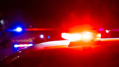 Police lights flashing at night.