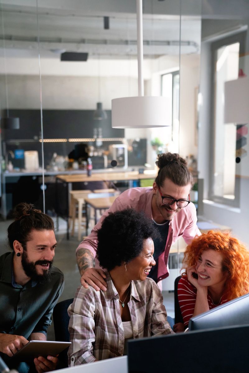 Team of programmers writing digital code in the metaverse and working together on the internet. Group of web designers developing a cybersecurity website, app or software in the office