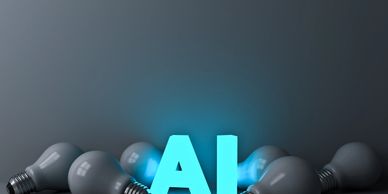 Glowing blue AI letters surrounded by unlit gray light bulbs.