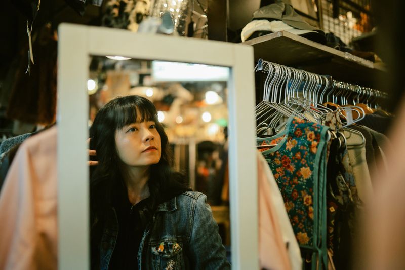Image of a cool, young mixed race Asian - Latin woman in Tokyo. She is going through vintage shops, meeting her friends, spending an easy afternoon in Tokyo’s hip neighbourhood Shimokitazawa.
