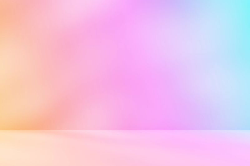 Abstract colourful room studio with pink yellow orange blue colours. Shadow of leaves overlay effect. Product presentation showroom. Minimal mock up blurred backdrop.