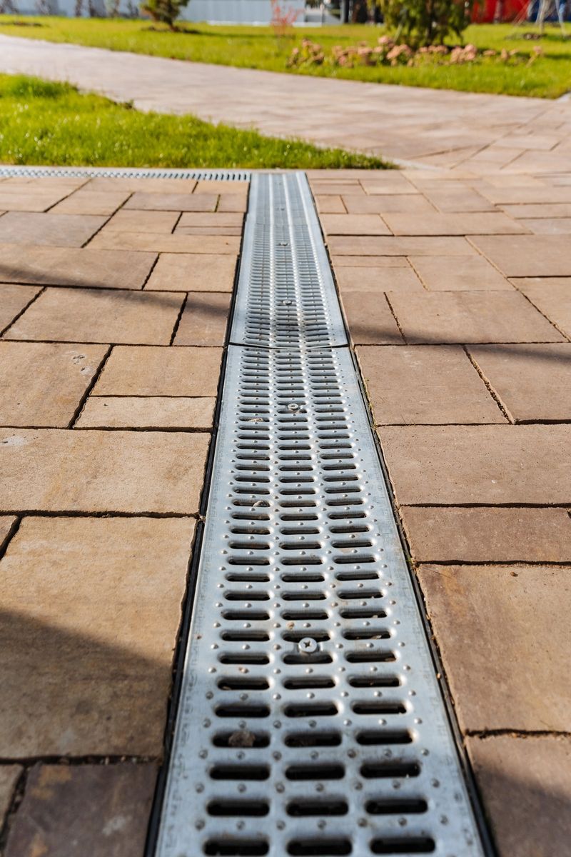 This innovative modern drainage system significantly enhances paved pathways by improving water management, while also boosting the overall aesthetics of various outdoor spaces