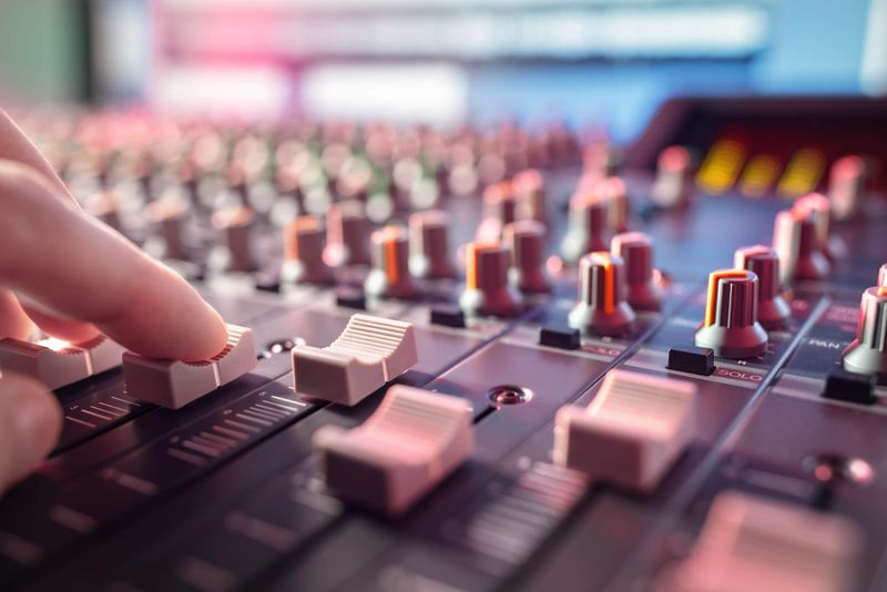 Sound recording studio mixing desk with engineer or music producer pov