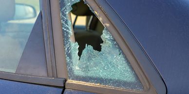 Damage to side glass.