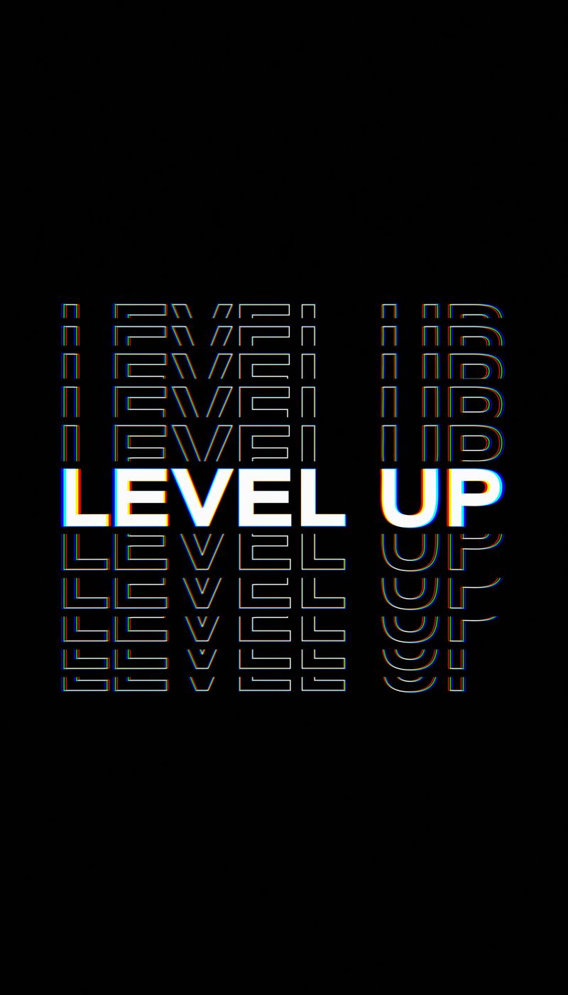 Vertical illustation of level up title in white on a black background - Suitable for gaming.