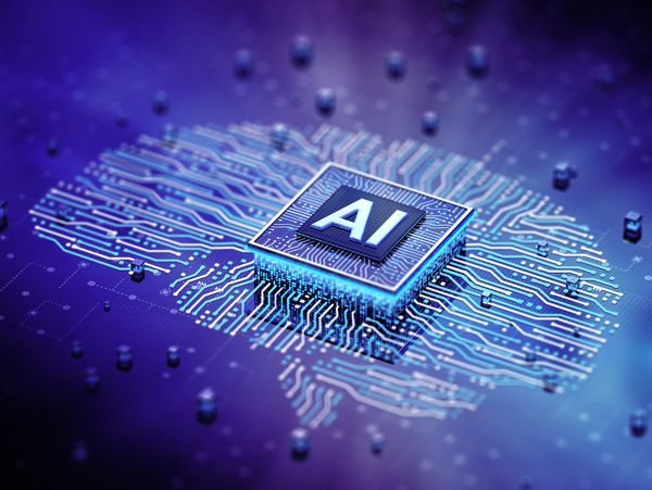 A glowing AI chip on a digital circuit board in blue