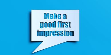 Speech bubble with 'Make a good first impression' on blue background.