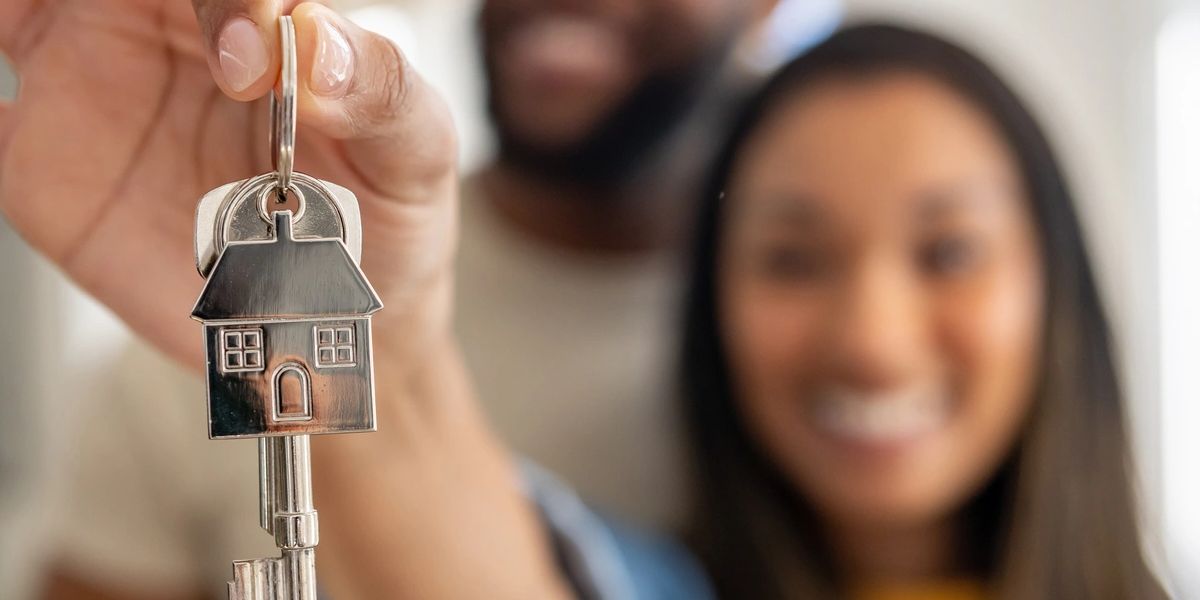 California homeowner reviewing foreclosure prevention options with a real estate specialist