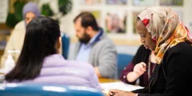 Multicultural people in a meeting room.