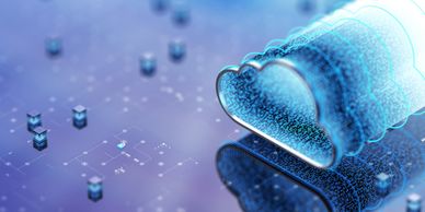 A young man working on a laptop while sitting on a wooden bench outdoors.
