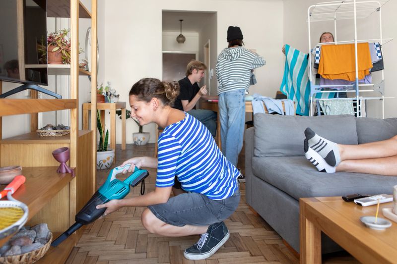 Latin American roommates doing housework - Buenos Aires - Argentina