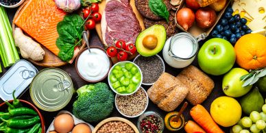 A colorful assortment of fresh fruits, vegetables, meats, and grains.