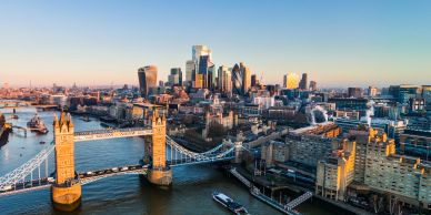 View of Tower Bridge and London city skyline.