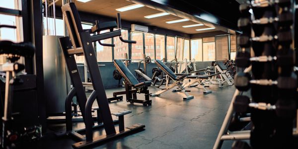 Empty gym with weight and exercise machines.
