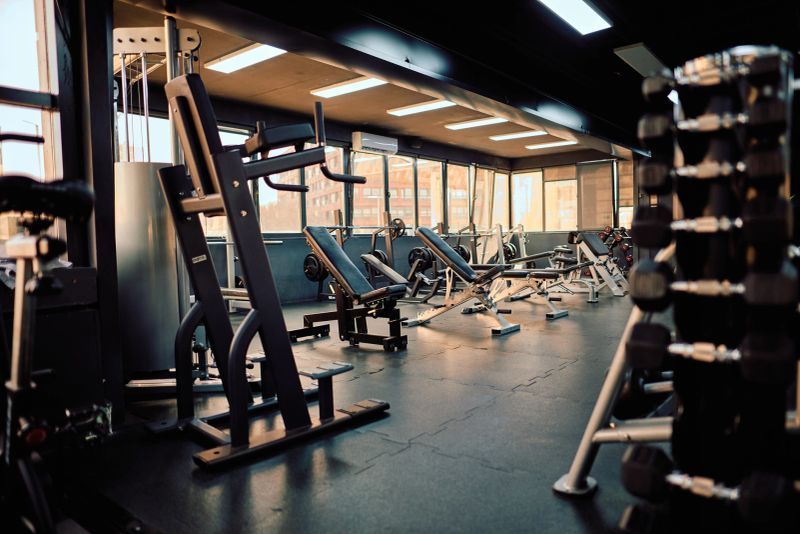 Modern gym featuring various training apparatus, providing an ideal environment for exercising and maintaining fitness while promoting a healthy lifestyle and overall wellbeing