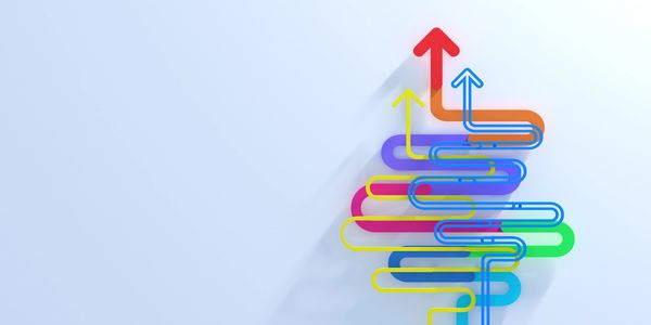 Colorful arrows intertwine and point upwards, symbolizing growth and direction.