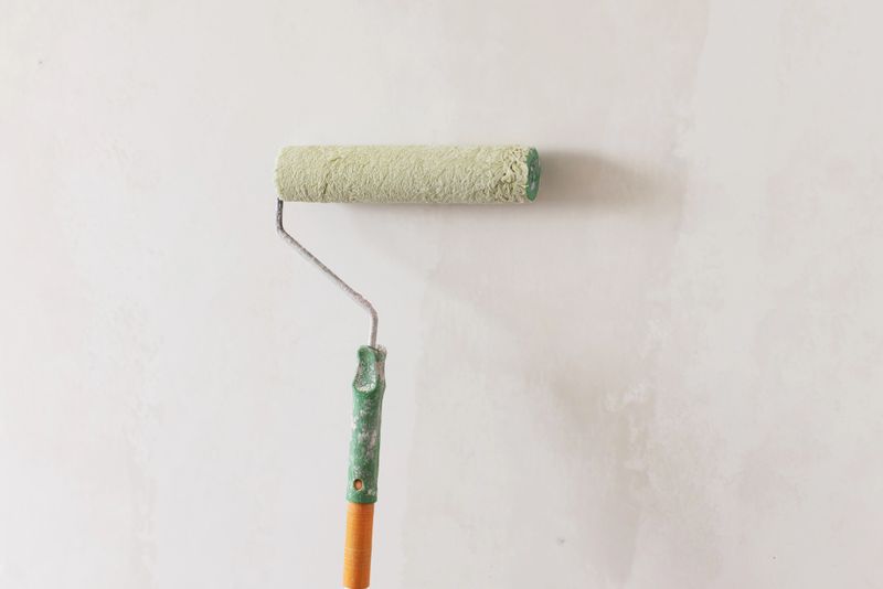 Apply primer on wall. Roller
